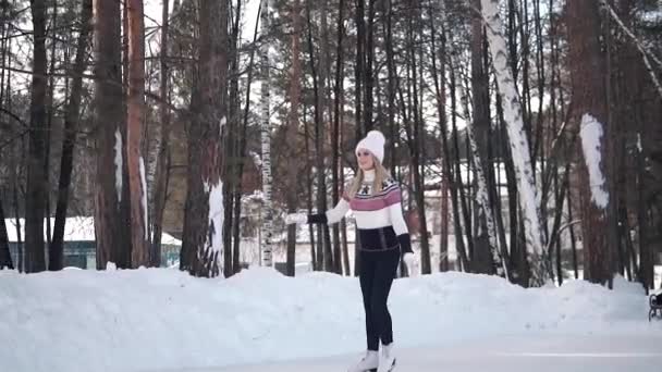 Girl Skates On A Skating Rink In A Winter Forest Slow Motion