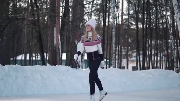Girl Skates On A Skating Rink In A Winter Forest Slow Motion