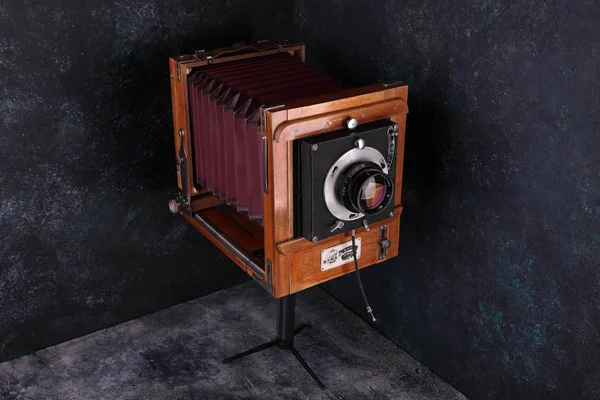 MOSCOW, RUSSIA, FEBRUARY 05, 2019. Vintage wooden camera FKD-13x18 on a cement background. The old studio camera for using plates.