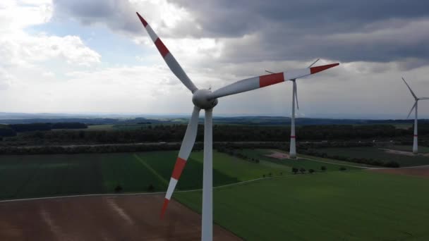 Aerial flight over wind power plants - wind energy mills from above — Stock Video