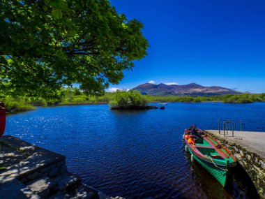 Amazing deep blue lake at Killarney National Park - an idyllic romantic place clipart