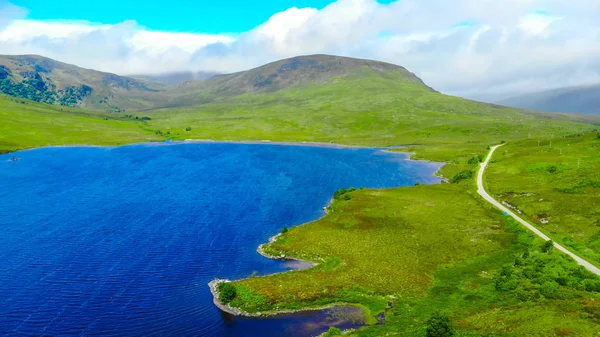 Aerial view over small lakes and creeks in the highlands of Scotland — Stock Photo, Image