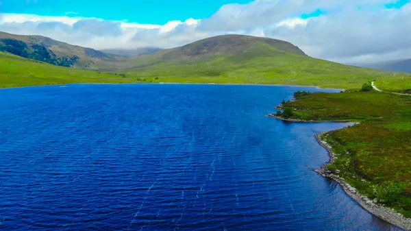 Aerial view over small lakes and creeks in the highlands of Scotland — Stock Photo, Image