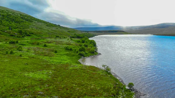 Aerial view over small lakes and creeks in the highlands of Scotland — Stock Photo, Image