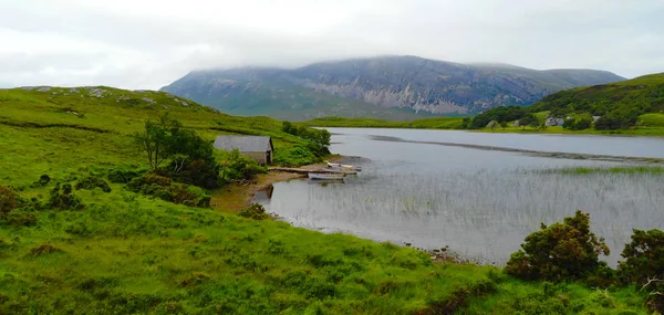 Aerial view over small lakes and creeks in the highlands of Scotland — Stock Photo, Image