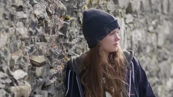 Close up shot of a young thoughtful woman — Stock Video