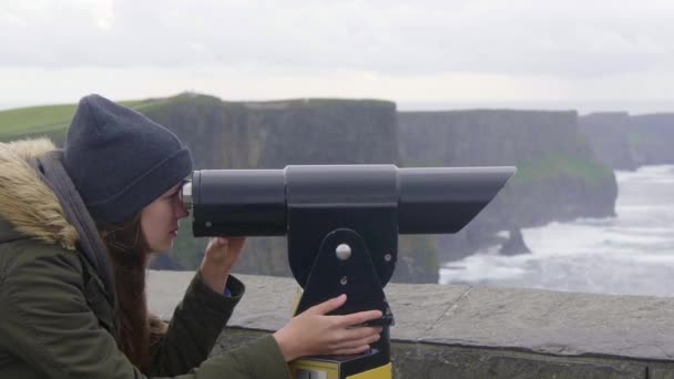 Watching the Cliffs of Moher in Ireland through a spyglass — Stock Video