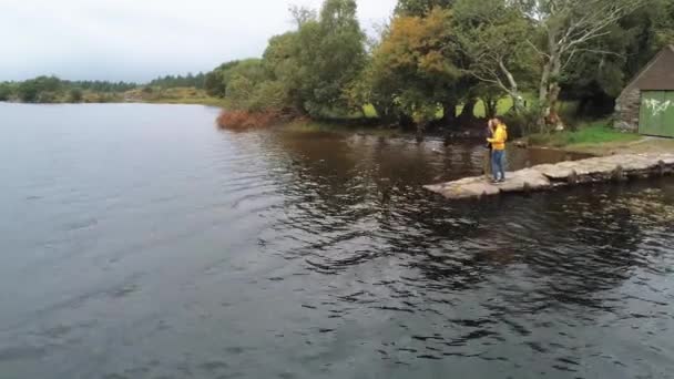 Flight over a small romantic lake — Stock Video