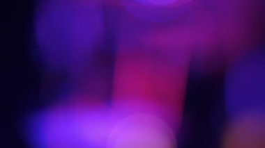 Mavi ve mor hareketli bokeh arka plan hareketli