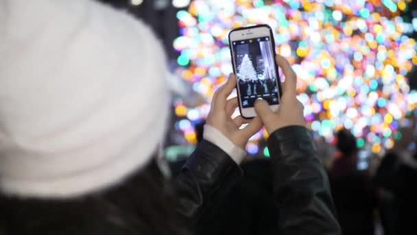 Taking photos of the beautiful Christmas decoration — Stock Video