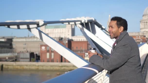 African Black Man Enjoys View River Thames London Millennium Bridge — Video