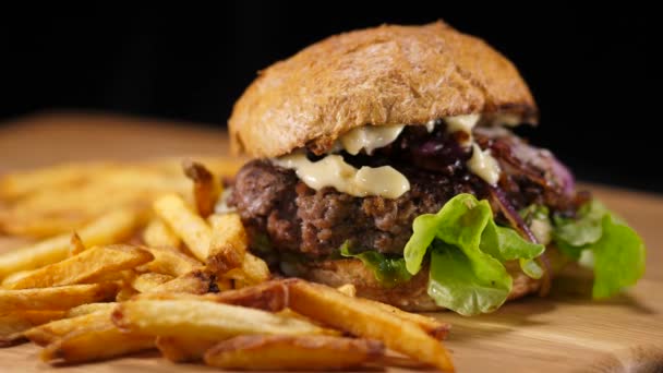 Big Special Beef Burger with fries- close up shot — Stock Video