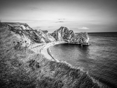 Durdle kapı - Devon İngiltere'deki en ünlü dönüm noktası üzerinden günbatımı