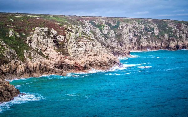 Deep blue Ocean water at the coast of Cornwall - travel photography