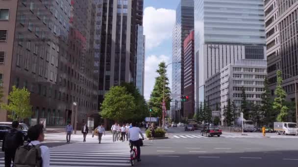 Street view at Tokyo station - the central railway station in the city - TOKYO, JAPAN - JUNE 19, 2018 — Stock Video