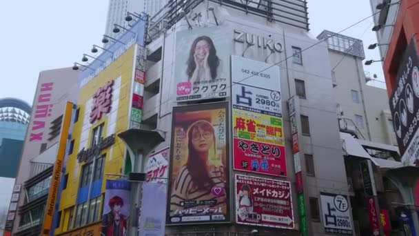 The busy shopping district of Ikebukuro in Toshima Tokyo - TOKYO, JAPAN - JUNE 18, 2018 — Stock Video