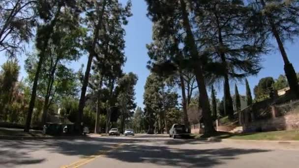 Guidare attraverso Beverly Hills a Los Angeles - LOS ANGELES. USA - 18 marzo 2019 — Video Stock