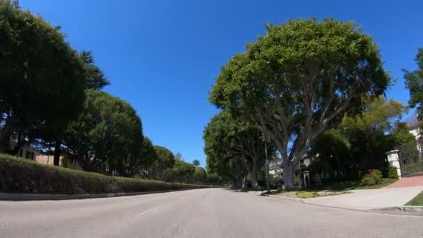 Przejazd przez Beverly Hills w Los Angeles - LOS ANGELES. Stany Zjednoczone - 18 marca 2019 — Wideo stockowe