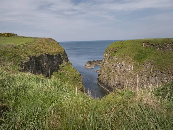 Amazing Causeway Coast in Northern Ireland on a sunny day - travel photography