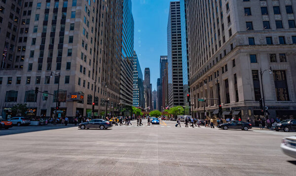 Street canyon in Chicago downtown - CHICAGO, ILLINOIS - JUNE 11, 2019