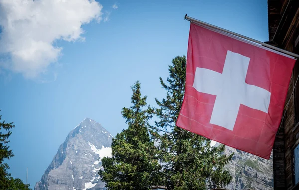 Swiss Flag in the Swiss Alps of Switzerland - travel photography