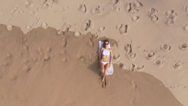 Beautiful Woman Relaxes Sandy Beach Ocean Aerial Drone Footage — Stock Video