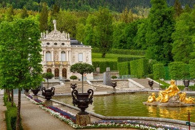 The beautiful gardens of Linderhof Castle in Bavaria Germany - LINDERHOF, GERMANY - MAY 27, 2020. High quality photo clipart