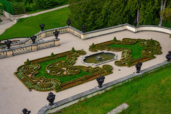 The beautiful gardens of Linderhof Castle in Bavaria Germany - LINDERHOF, GERMANY - MAY 27, 2020. High quality photo