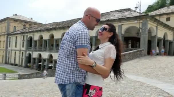 OROPA, BIELLA, ITALY - JULY 7, 2018: beautiful married couple man and woman hugging. Shrine of Oropa, Sanctuary, Sacro monte della beata Vergine, located in the mountains near the city of Biella — Stock Video