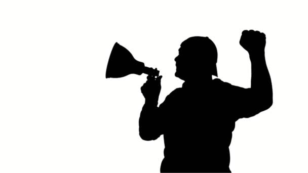 Black silhouette of protester holds a megaphone, shouts out slogans, on white background. Activist at a protest, rally, demonstration — Stock Video