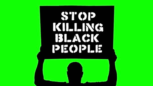 Animacja. Czarna sylwetka protestującego trzyma plakat, sztandar nad głową, z hasłem... Przestań zabijać czarnych. Zielone tło. Protesty na rzecz praw i wolności czarnych w USA — Wideo stockowe
