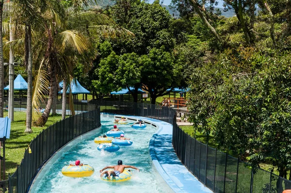 water park, pool area known as lazy river on a sunny day