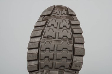 Medellin, Kolombiya - Marzo 01, 2019: Deri Caterpillar botlar gri arka plan üzerinde