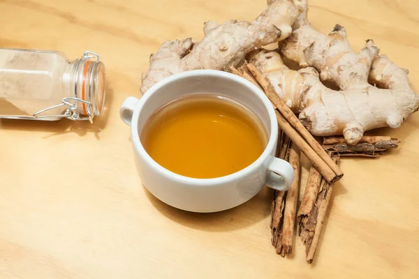 Drink Made Ginger Root Cinnamon Photo Wooden Background — Stock Photo, Image