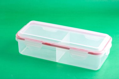 Hava geçirmez Lid ile çok amaçlı plastik kap; Yeşil Arkaplanda Fotoğraf.