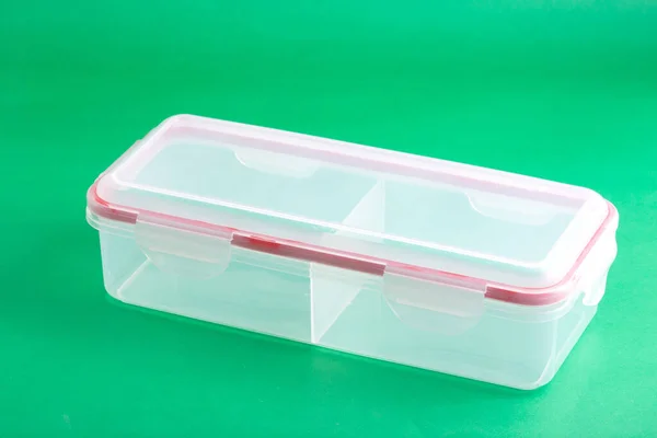 Multipurpose Plastic Container With Airtight Lid; Photo On Green Background.
