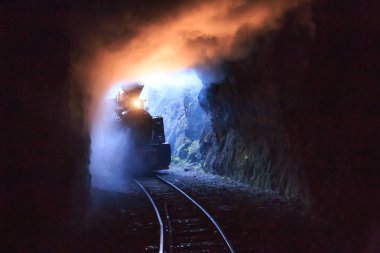 Europe, Romania, Viseu de Sus. Carpathian Forest Steam train. Vaser Valley Railway. Wood-burning, steam locomotive. Narrow-guage railway. Initiated 1932. clipart