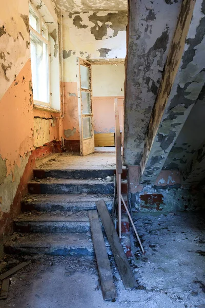 Eastern Europe, Ukraine, Pripyat, Chernobyl. Staircase, peeling paint.
