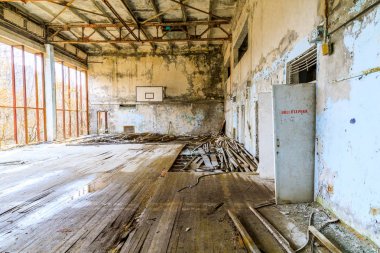 Eastern Europe, Ukraine, Pripyat, Chernobyl. Basketball court. April 11, 2018. clipart