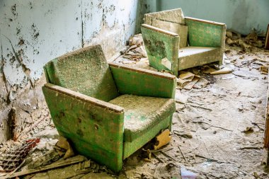 Eastern Europe, Ukraine, Pripyat, Chernobyl. The Hospital MsCh-126 (medical-sanitary unit). Modernist chairs. clipart