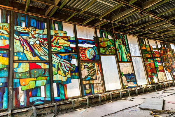Ukraine, Pripyat, Chernobyl. Stained glass windows in Cafe Pripyat. April 11, 2018.
