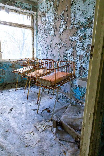 Eastern Europe, Ukraine, Pripyat, Chernobyl. The Hospital MsCh-126 (medical-sanitary unit). Infant beds in maternity area.