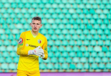 POLTAVA, UKRAINE - 1 Mart 2020: Ukrayna Premier Ligi karşılaşmasında Ukraynalı futbolcu Dmytro Riznyk Vorskla-Shakhtar maçı Vorskla Stadyumu 'nda