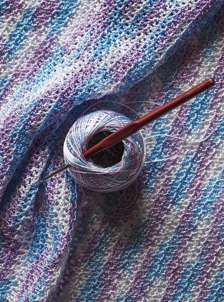 Crocheted fabric made of multi-colored microfiber. Melange thread. — Stock Photo, Image