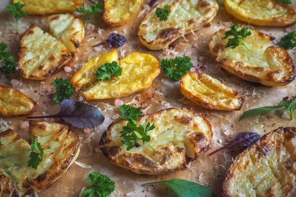 Crunchy smashed potatoes sprinkled with crispy parsley. — Stock Photo, Image