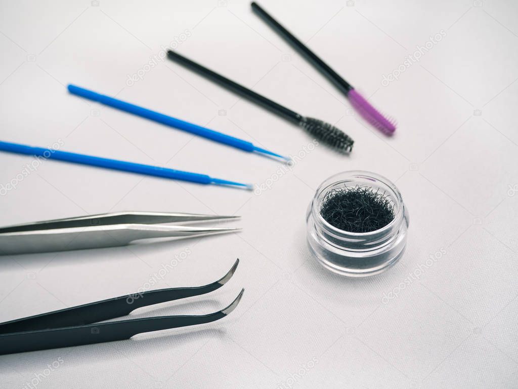 False eyelashes and tools for sticking eyelashes.