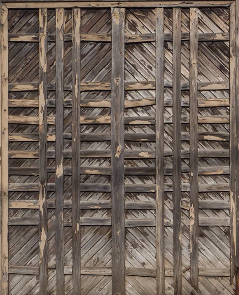 Cancello in legno vintage. Vecchio sfondo marrone in legno . — Foto Stock