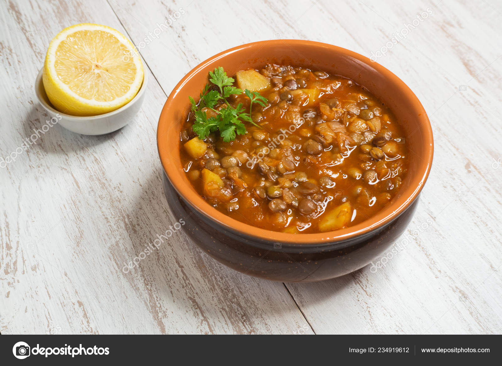 Lentil soup. Adasi Persian soup with lentils. Stock Photo by