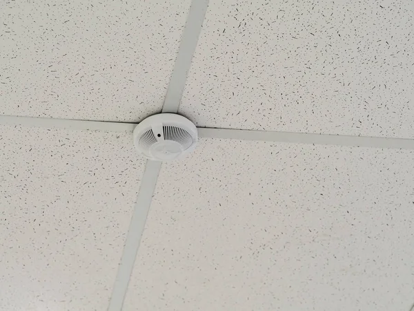 Fire alarm sensor on the ceiling. Close up.