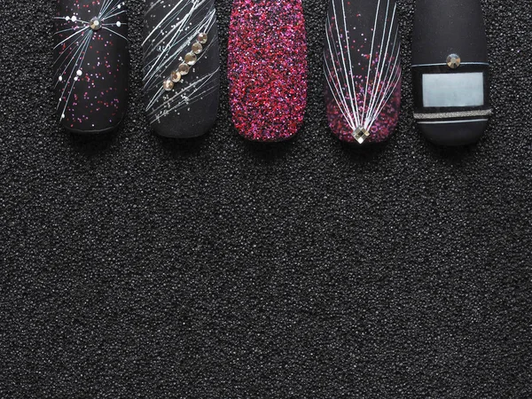 Stylish design on tips. Macro texture of nails.